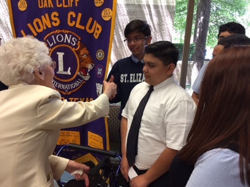 St. E's students greeted by Mrs. C at LIONS.JPG